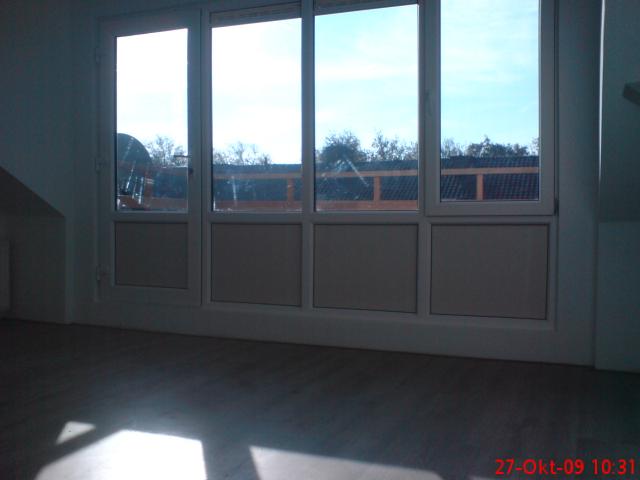 bovenste woonlaag , kunststof pui met draai-kiepraam en deur