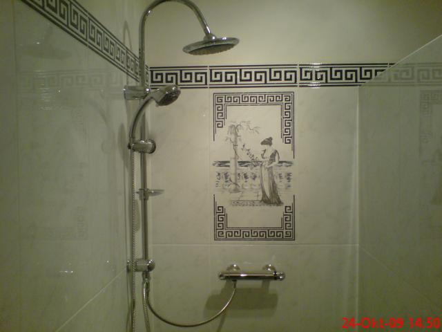 maxi tegels 68x33 , rain shower en drain alles laatste trend !